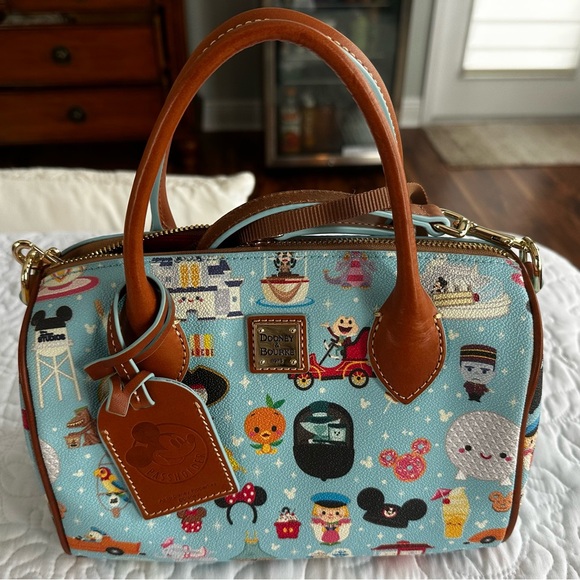 Dooney & Bourke Handbags - Dooney & Bourke Light Blue Disney Parks Printed Satchel with Tan Trim